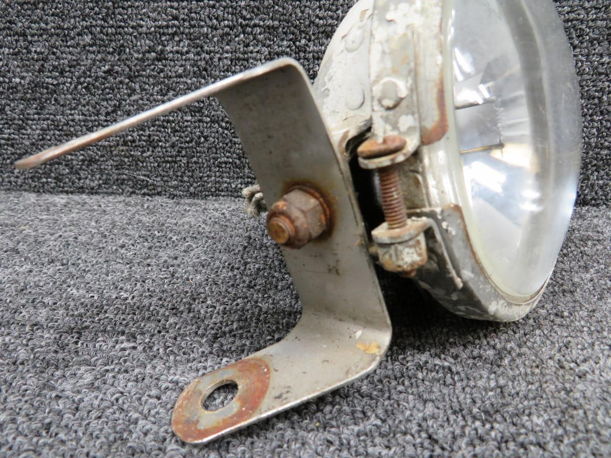 Cessna Aircraft Parts 0842215-8 (Use: B-4150B-4594) Cessna Taxi Light (Dented Canopy, Rusted Retainer)