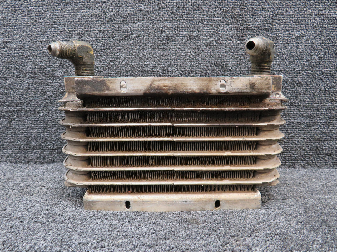 8406E Stewart Warner Oil Cooler Assembly (Bent Mount) – BAS Part Sales