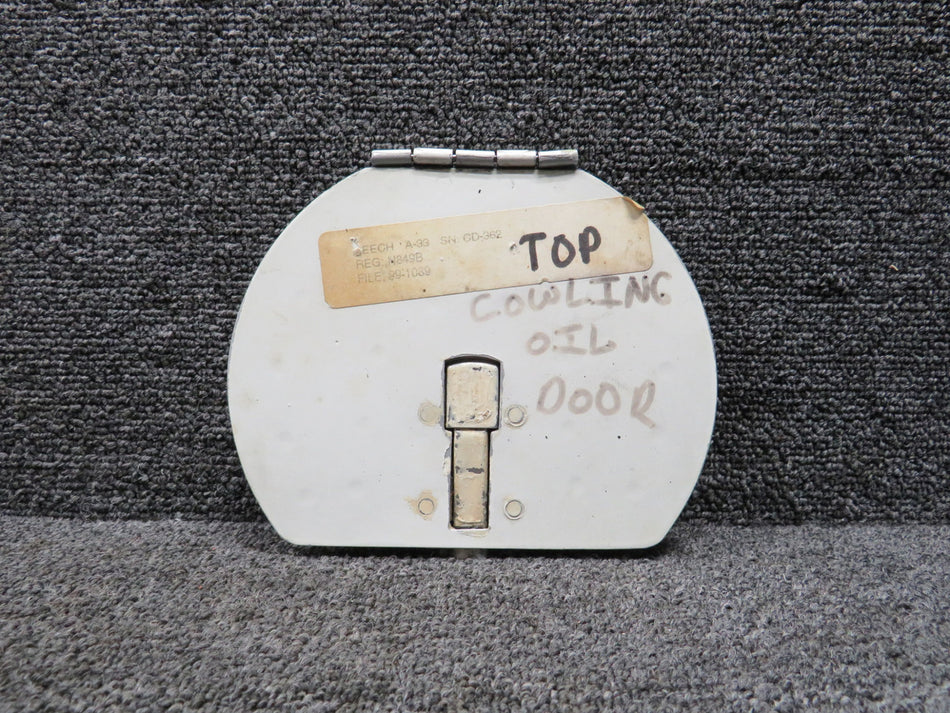35-910160-50 Beechcraft A33 Oil Filter Door (Bent Hinge Half)