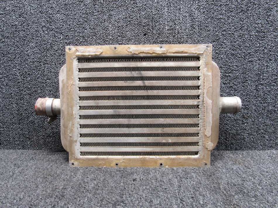 8541001 (Alt: 101-381010-1) Harrison HE29-189 Oil Cooler (Slight Bends on Mount)