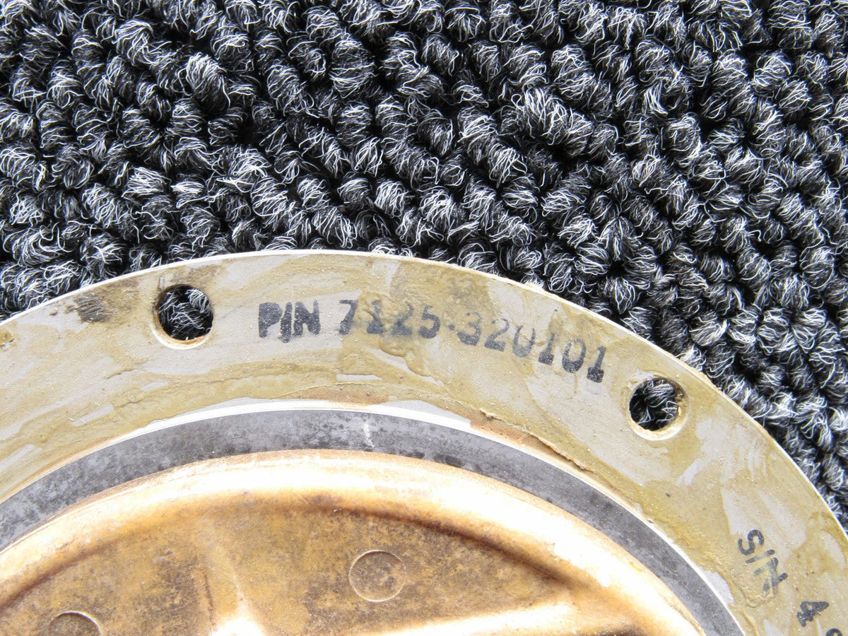 Cessna Tailcone Air Distribution System Check Valve 7125-320101 with detailed markings and brass finish.