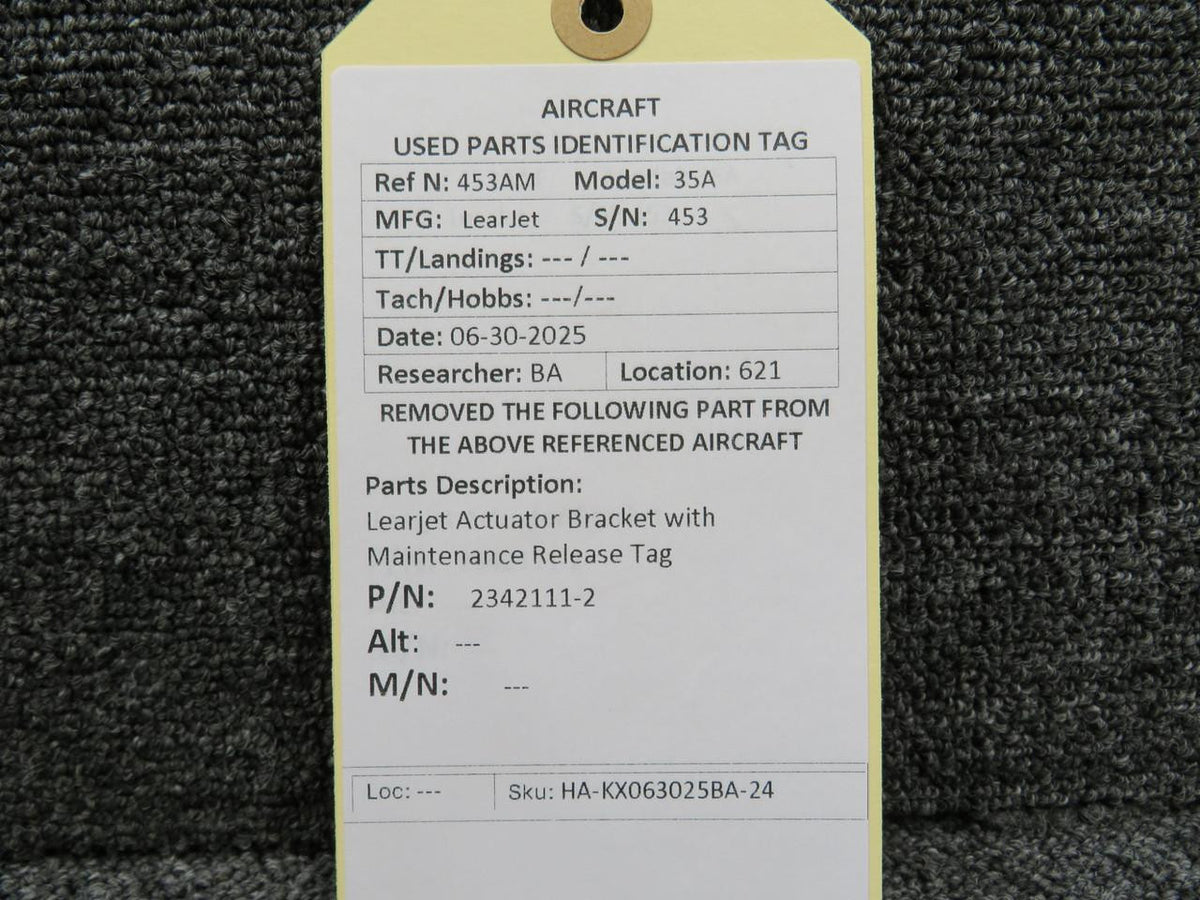 LearJet 2342111-2 Learjet Actuator Bracket with Maintenance Release Tag