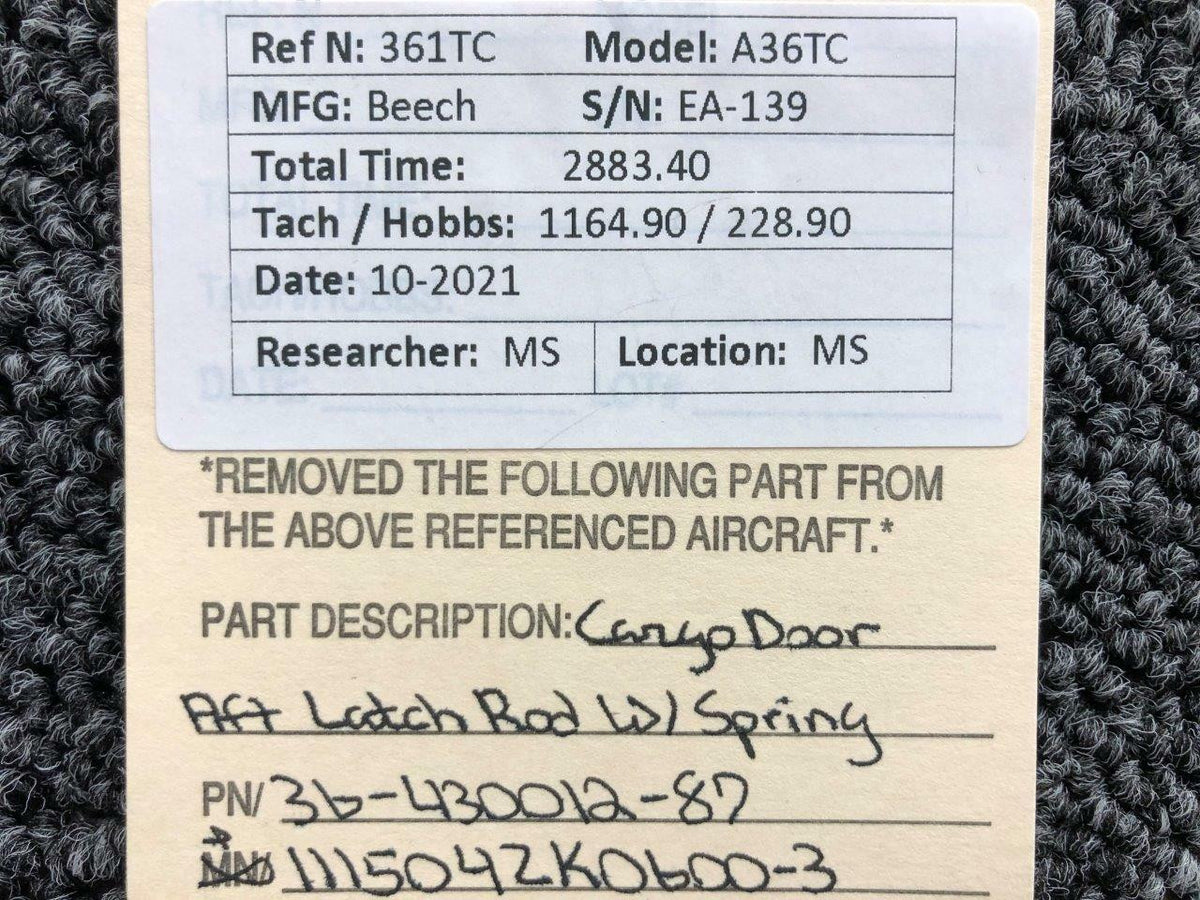 36-430012-87 / 111504ZK0600-3 Beech A36TC Cargo Door Aft Latch Rod W/ Spring BAS Part Sales | Airplane Parts