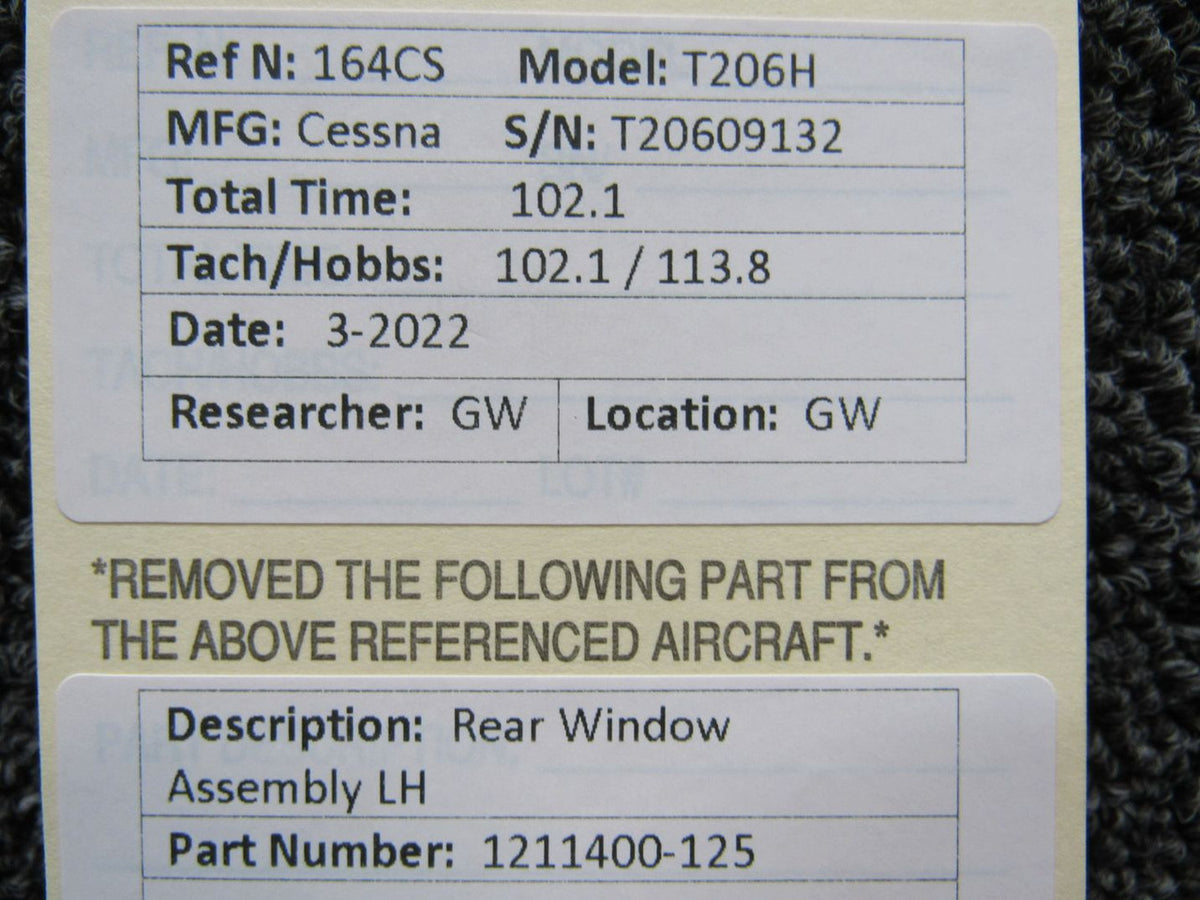 1211400-125 Cessna T206H Rear Window Assembly LH BAS Part Sales | Airplane Parts