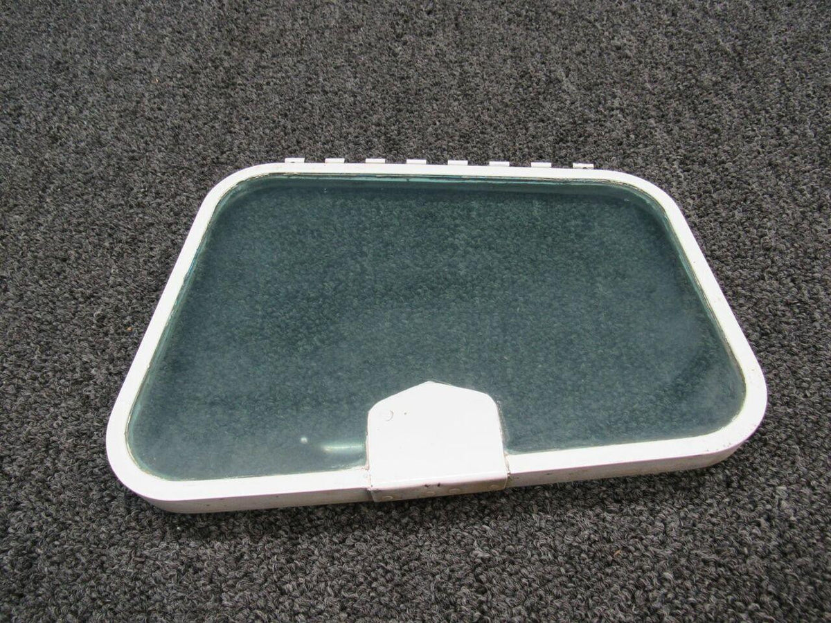 1210041-1 Cessna 210 Storm Window Assembly (Green Tint) BAS Part Sales | Airplane Parts