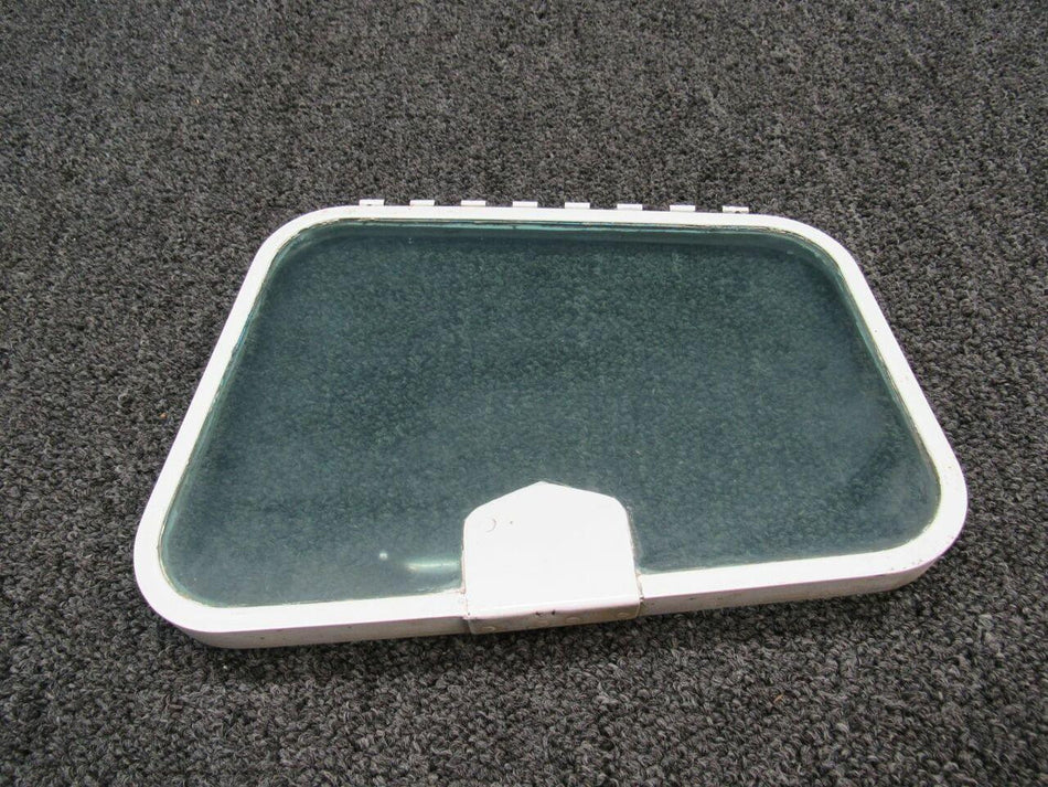 1210041-1 Cessna 210 Storm Window Assembly (Green Tint) BAS Part Sales | Airplane Parts