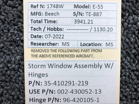 35-410291-219 (USE: 002-430052-13) Beechcraft E-55 Storm Window AssY W/ Hinges BAS Part Sales | Airplane Parts