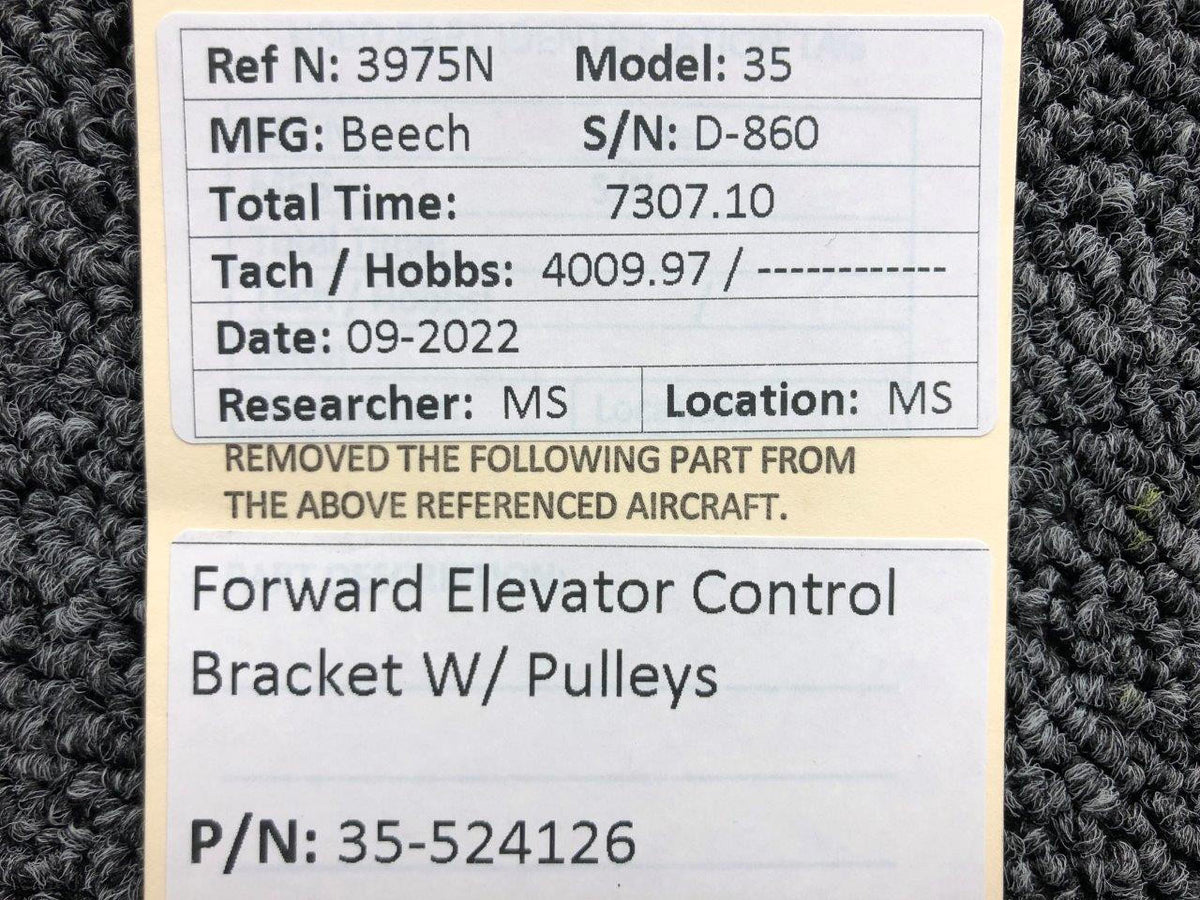35-524126 Beechcraft 35 Forward Elevator Control Bracket W/ Pulleys BAS Part Sales | Airplane Parts