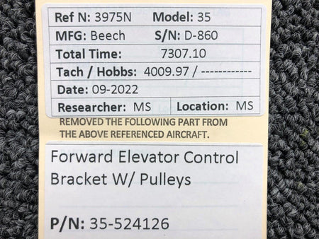 35-524126 Beechcraft 35 Forward Elevator Control Bracket W/ Pulleys BAS Part Sales | Airplane Parts