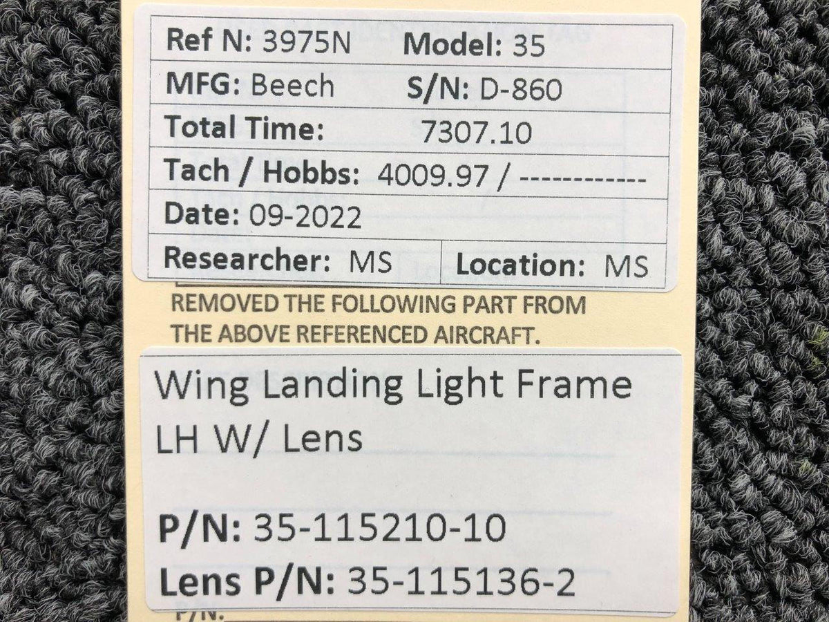 Beechcraft Parts 35-115210-10 / 35-115136-2 Beech 35 Wing Landing Light Frame LH W/ Lens