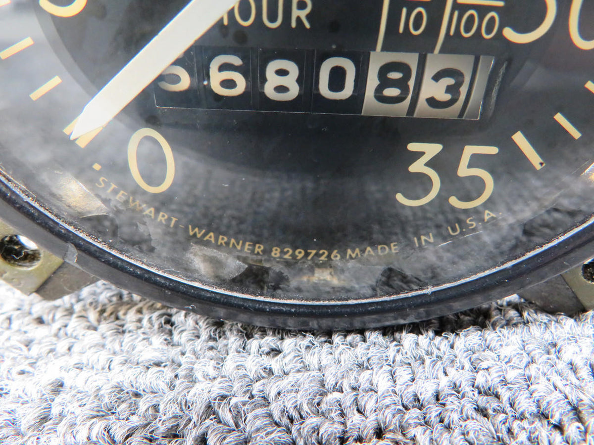 Stewart-Warner 829726 Stewart-Warner Recording Tachometer (Hours: 5680.83) (Worn Inner Face)