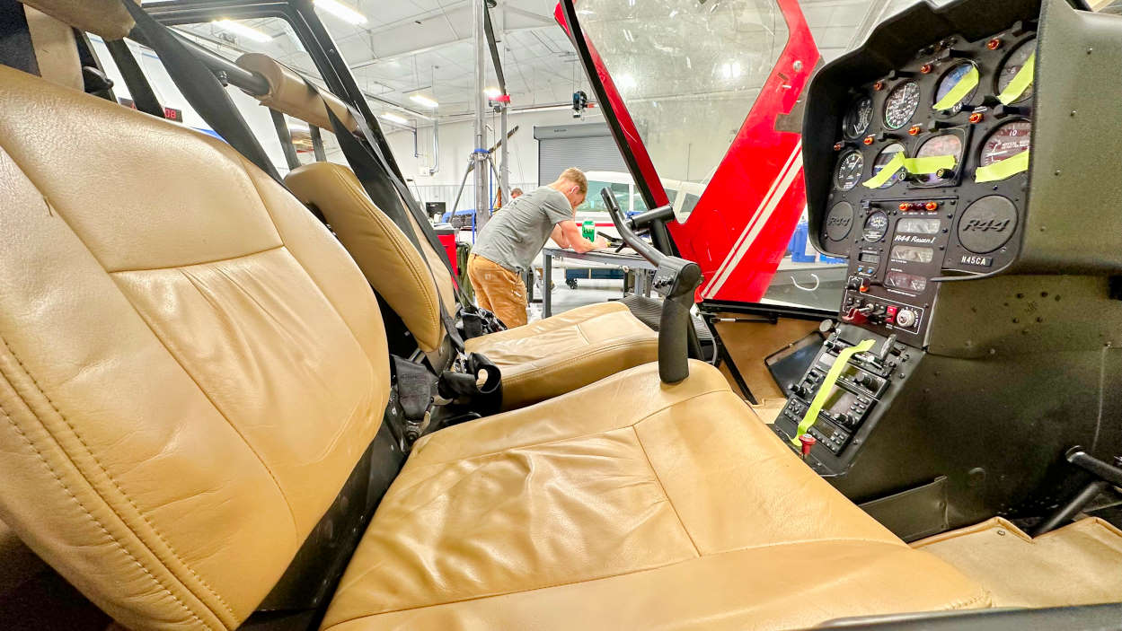 The interior of the Robinson R44 salvage aircraft in the BAS Hangar for disassembly