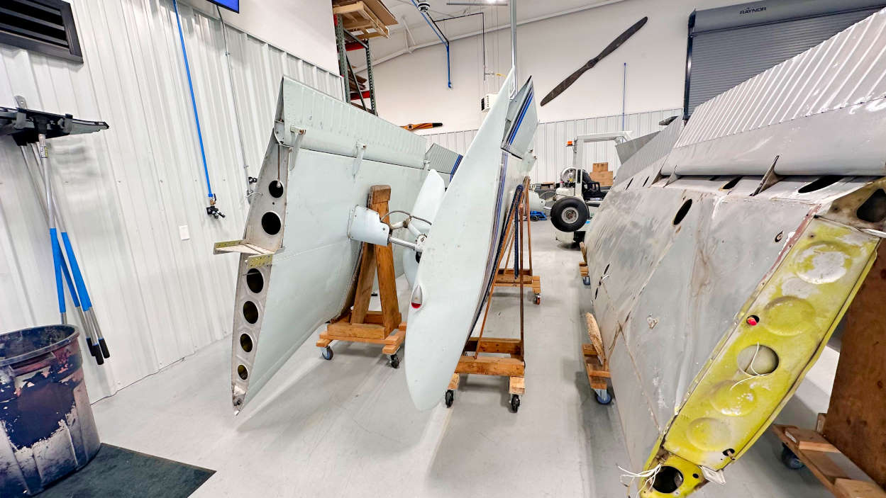 Piper airplane wings in the aircraft salvage hangar at BAS Part Sales