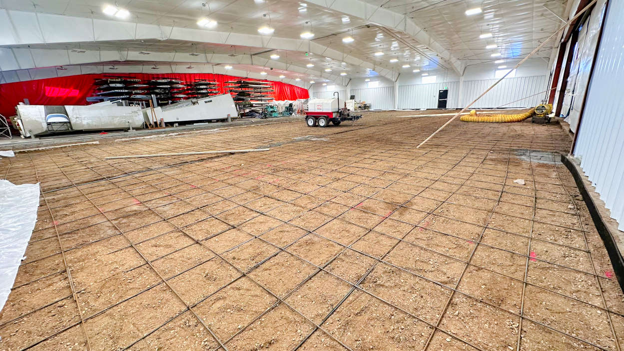 The rebar is down for new concrete to be poured in the expanded BAS used airplane parts hangar in Greeley