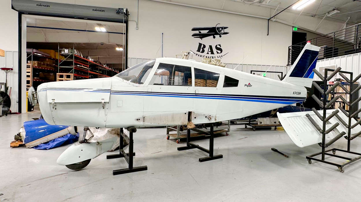 Piper PA28-180 Cherokee airplane salvage in the disassembly hangar