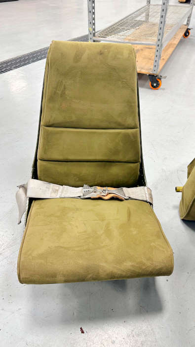 WWII era seats from the Ryan Navion airplane salvage unit 354