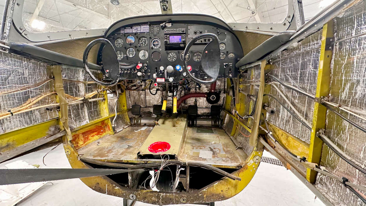 Ryan Navion instrument panel, yokes, and controls during the disassembly process for the salvage airplane
