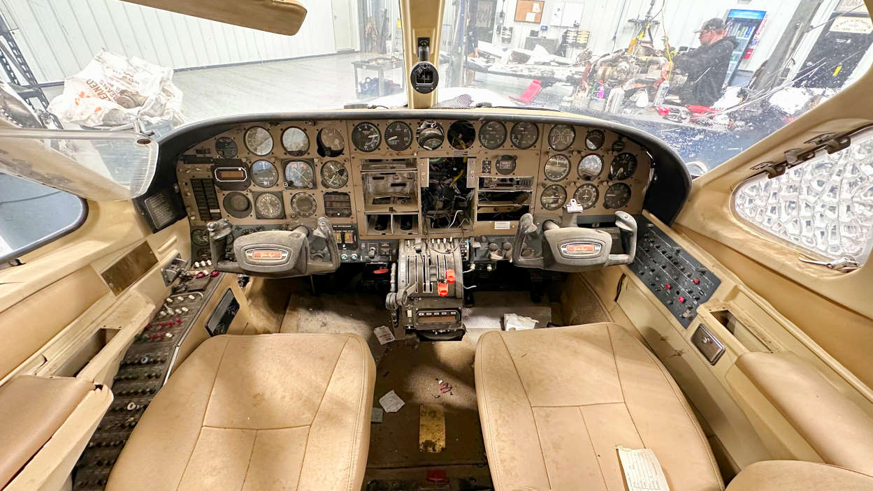 Cessna 421C cockpit before aircraft salvage disassembly